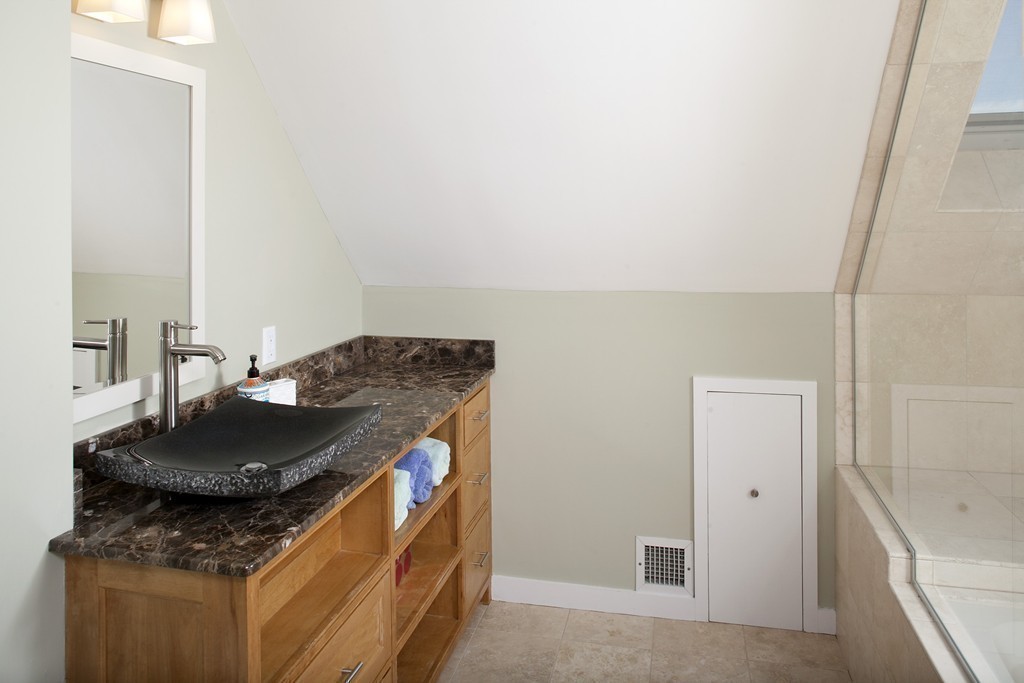 73 Seaside Road Scituate, MA 02066 - Photo 17 of 27 a kitchen with a stove and a refrigerator