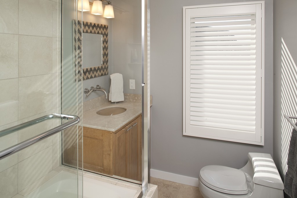 73 Seaside Road Scituate, MA 02066 - Photo 20 of 27 a bathroom with a sink toilet and mirror