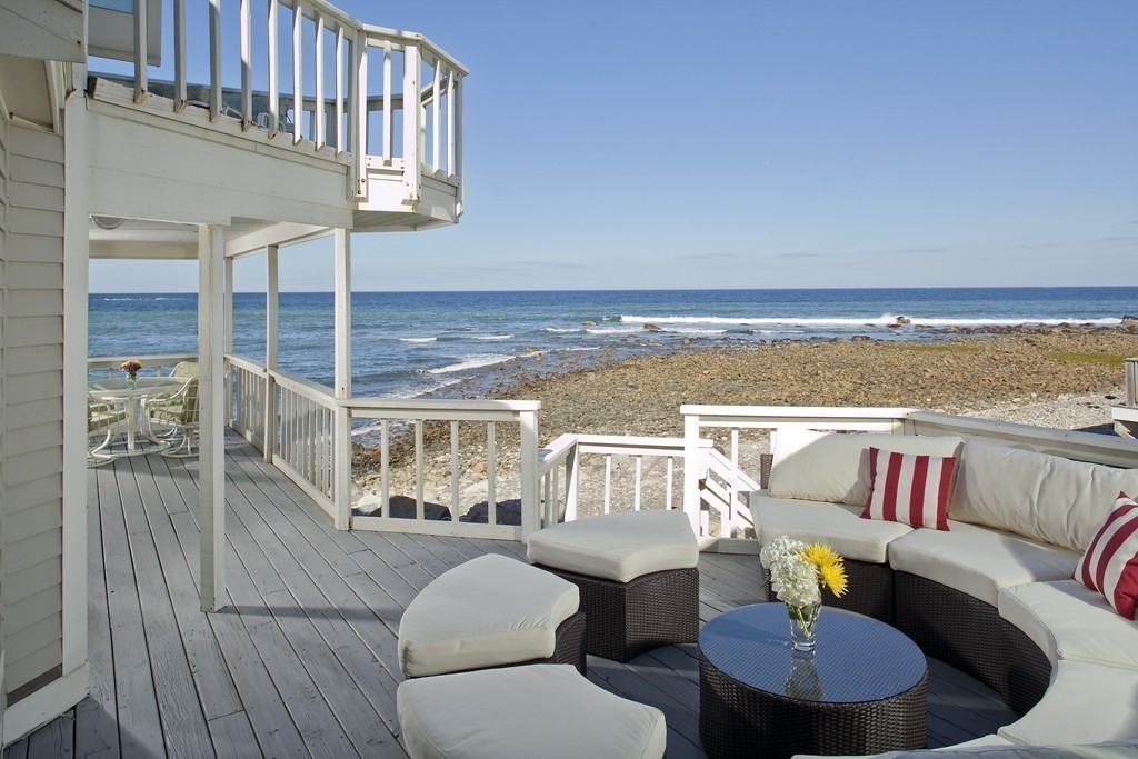 73 Seaside Road Scituate, MA 02066 - Photo 21 of 27 a living room with furniture and a table