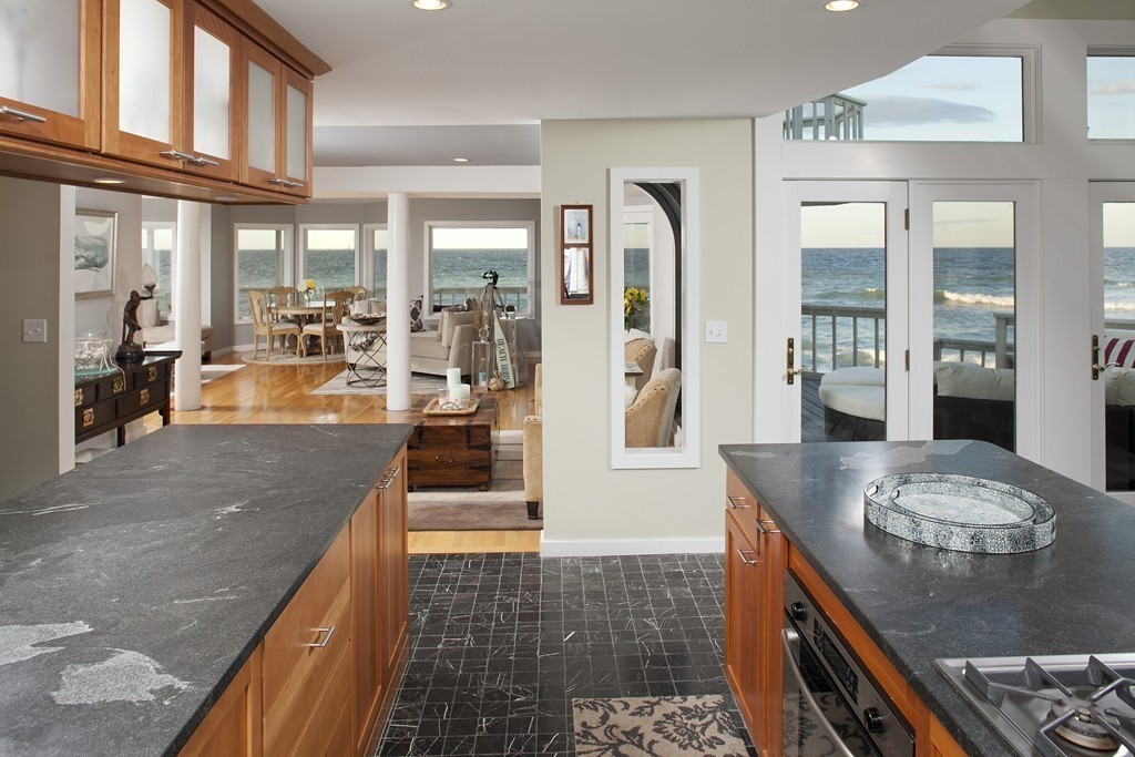 73 Seaside Road Scituate, MA 02066 - Photo 4 of 27 a dining hall with stainless steel appliances granite countertop a rug and a counter space
