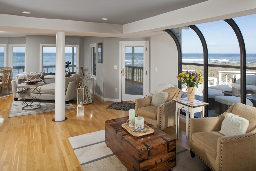 73 Seaside Road Scituate, MA 02066 - Photo 8 of 27 a living room with furniture and wooden floor