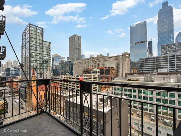 a view of city from a balcony