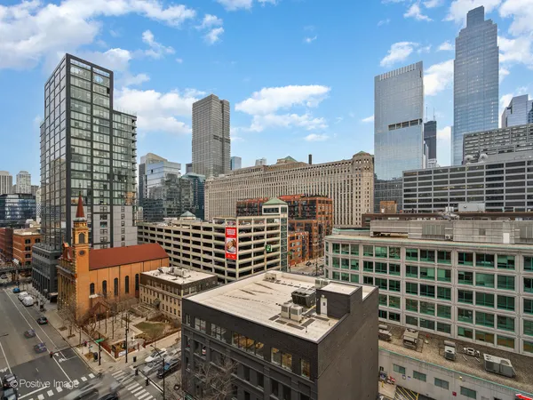 a view of a city with tall buildings