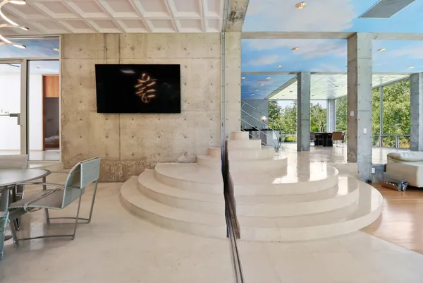 a room with furniture and a flat screen tv