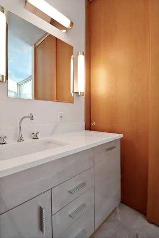 an aerial view of a house with yard