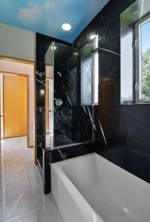 a aerial view of a house with a yard