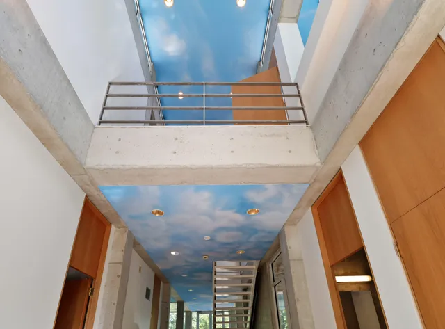 a kitchen with a refrigerator and a sink