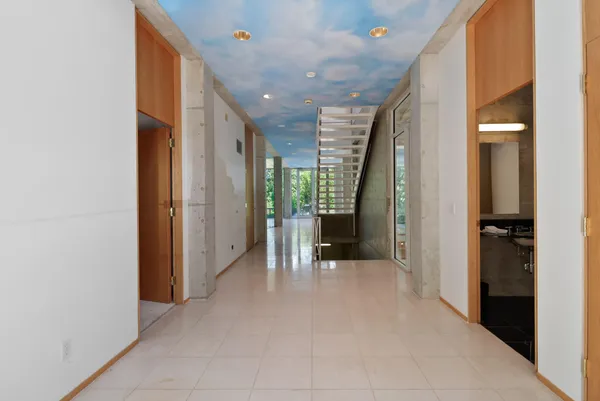 a kitchen with a stove a sink and a refrigerator