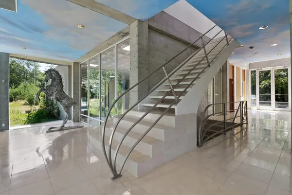 a outdoor dining space with furniture and outdoor view