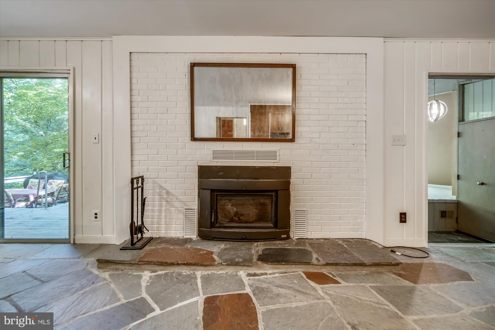 14711 Reserve Road Accokeek, MD 20607 - Photo 19 of 63 Wood burning inset in fireplace keeps house toasty