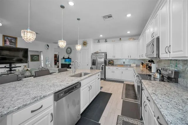 $370,000 | 944 Old Windsor Way, Spring Hill, FL 34609