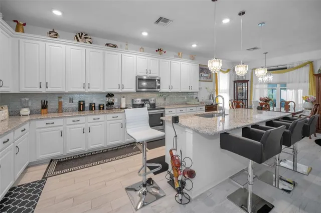 $370,000 | 944 Old Windsor Way, Spring Hill, FL 34609