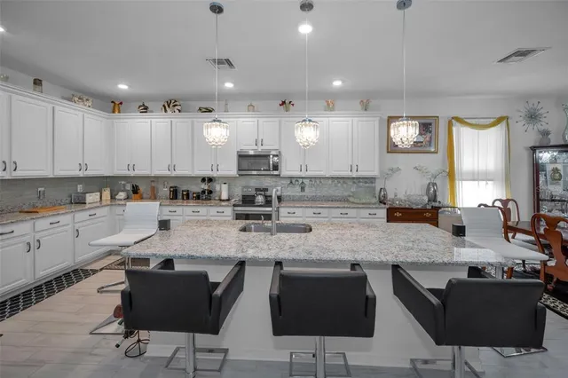 $370,000 | 944 Old Windsor Way, Spring Hill, FL 34609