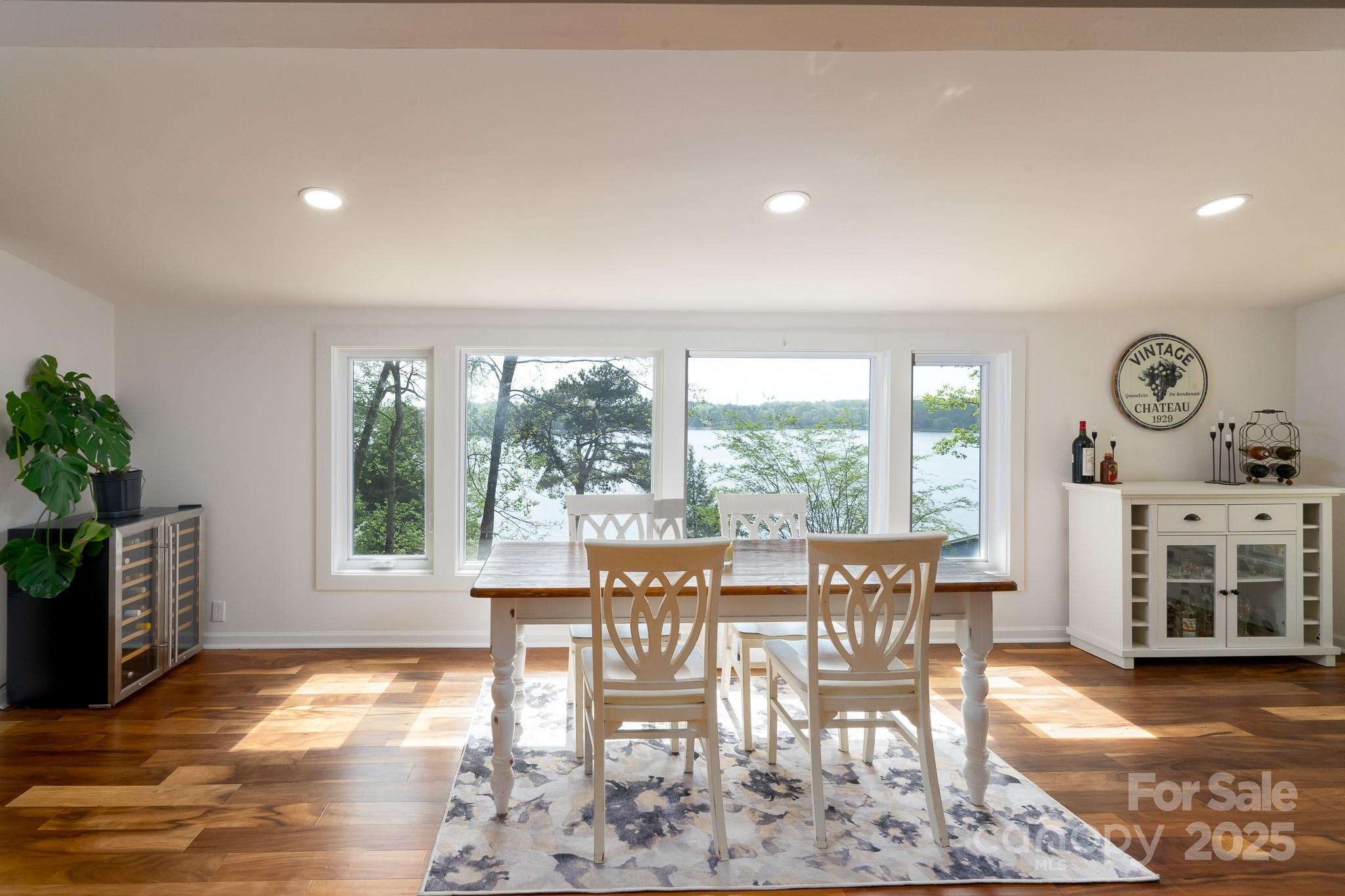 2066 Marquesas Avenue Fort Mill, SC 29708 - Photo 11 of 45 a view of a dining room with furniture window and wooden floor