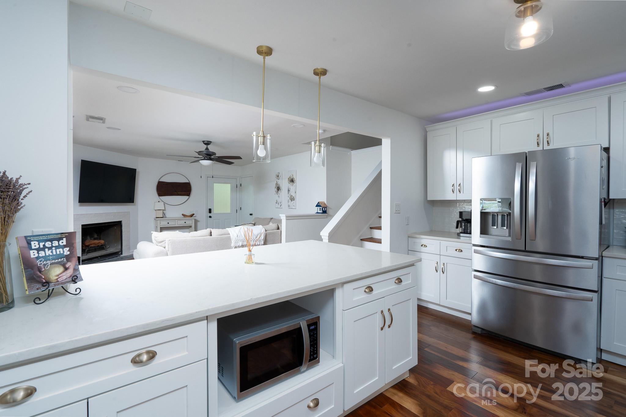 2066 Marquesas Avenue Fort Mill, SC 29708 - Photo 14 of 45 a kitchen with a sink stainless steel appliances and white cabinets