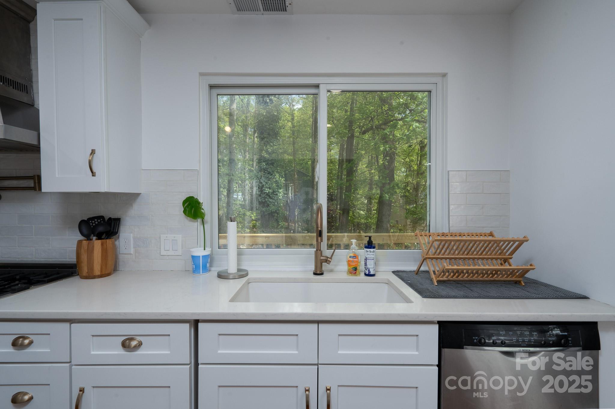 2066 Marquesas Avenue Fort Mill, SC 29708 - Photo 16 of 45 a kitchen with a sink and a window