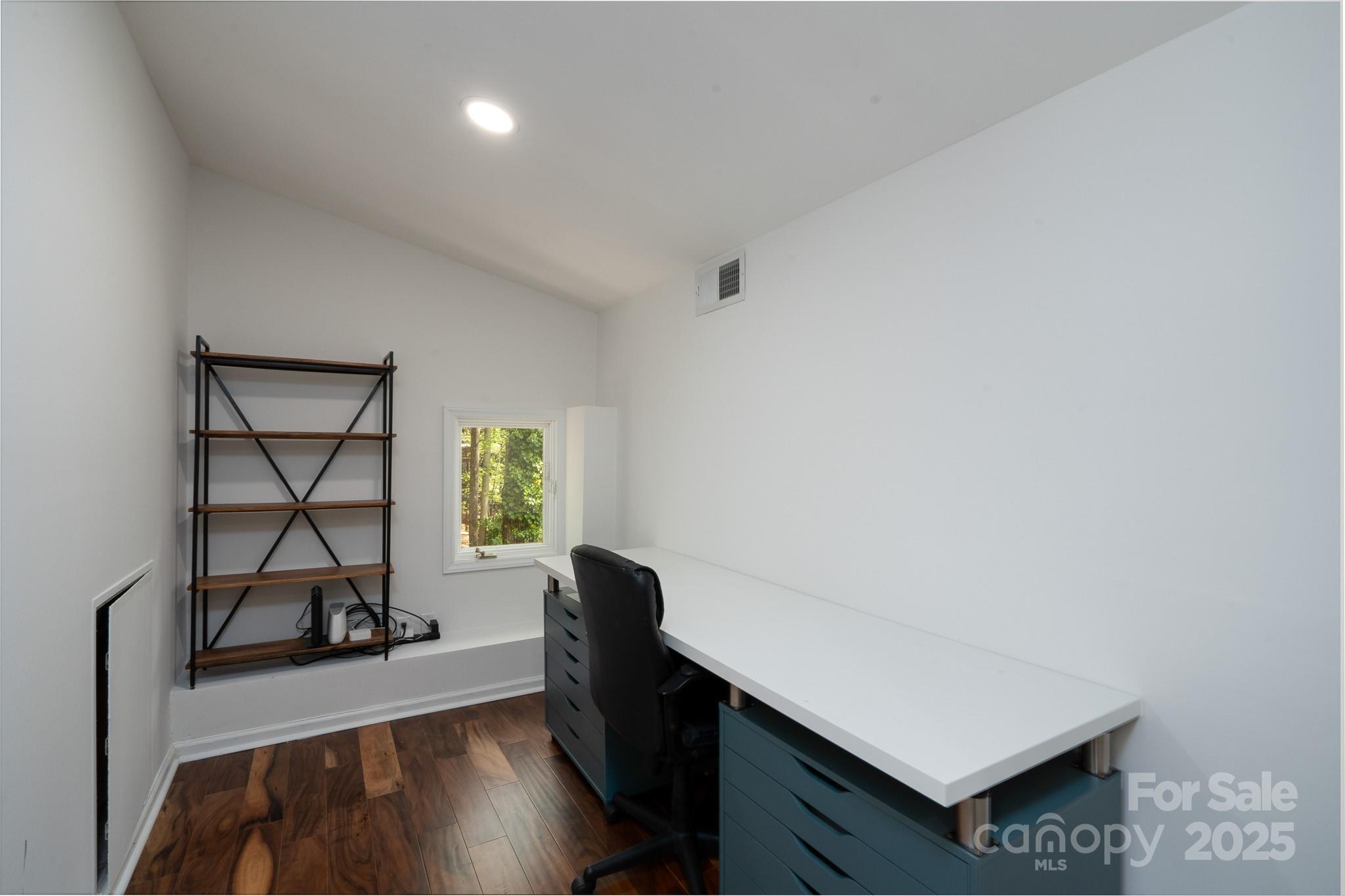 2066 Marquesas Avenue Fort Mill, SC 29708 - Photo 19 of 45 a view of workspace with wooden floor windows