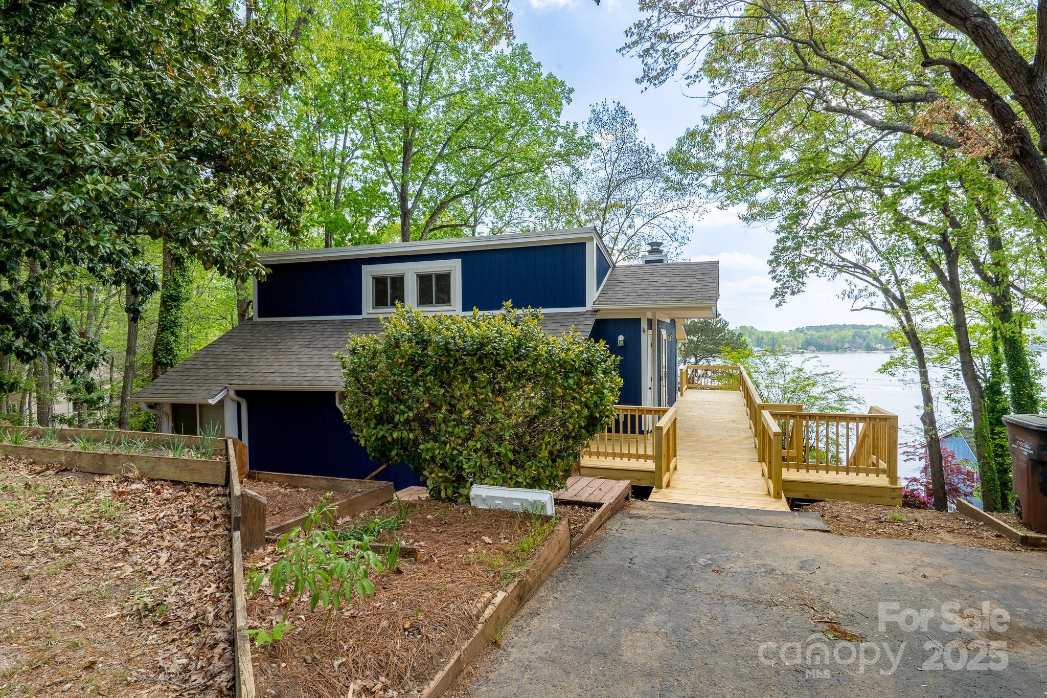 2066 Marquesas Avenue Fort Mill, SC 29708 - Photo 2 of 45 a front view of a house with a yard and garage
