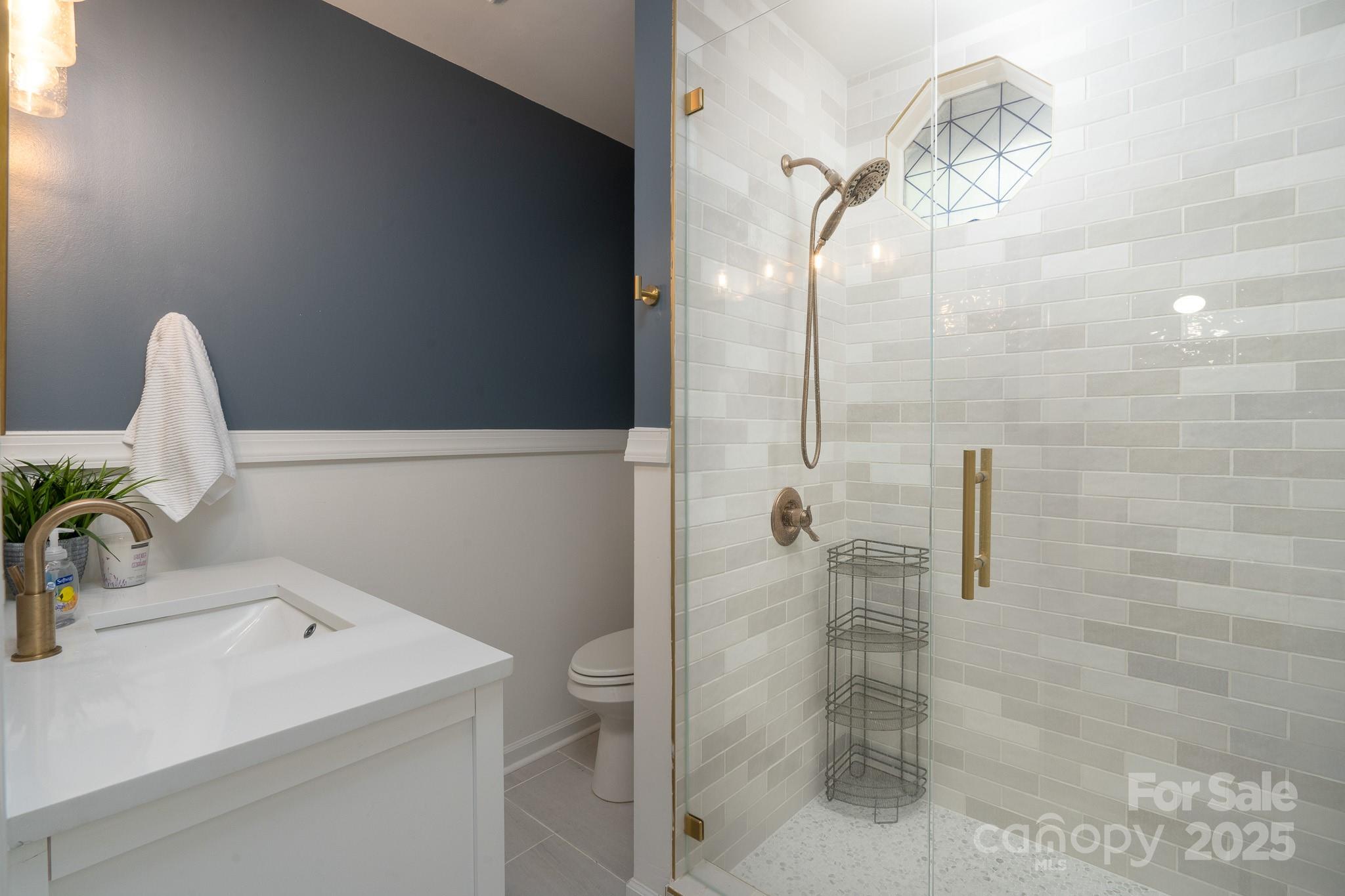 2066 Marquesas Avenue Fort Mill, SC 29708 - Photo 22 of 45 a bathroom with a sink and mirror