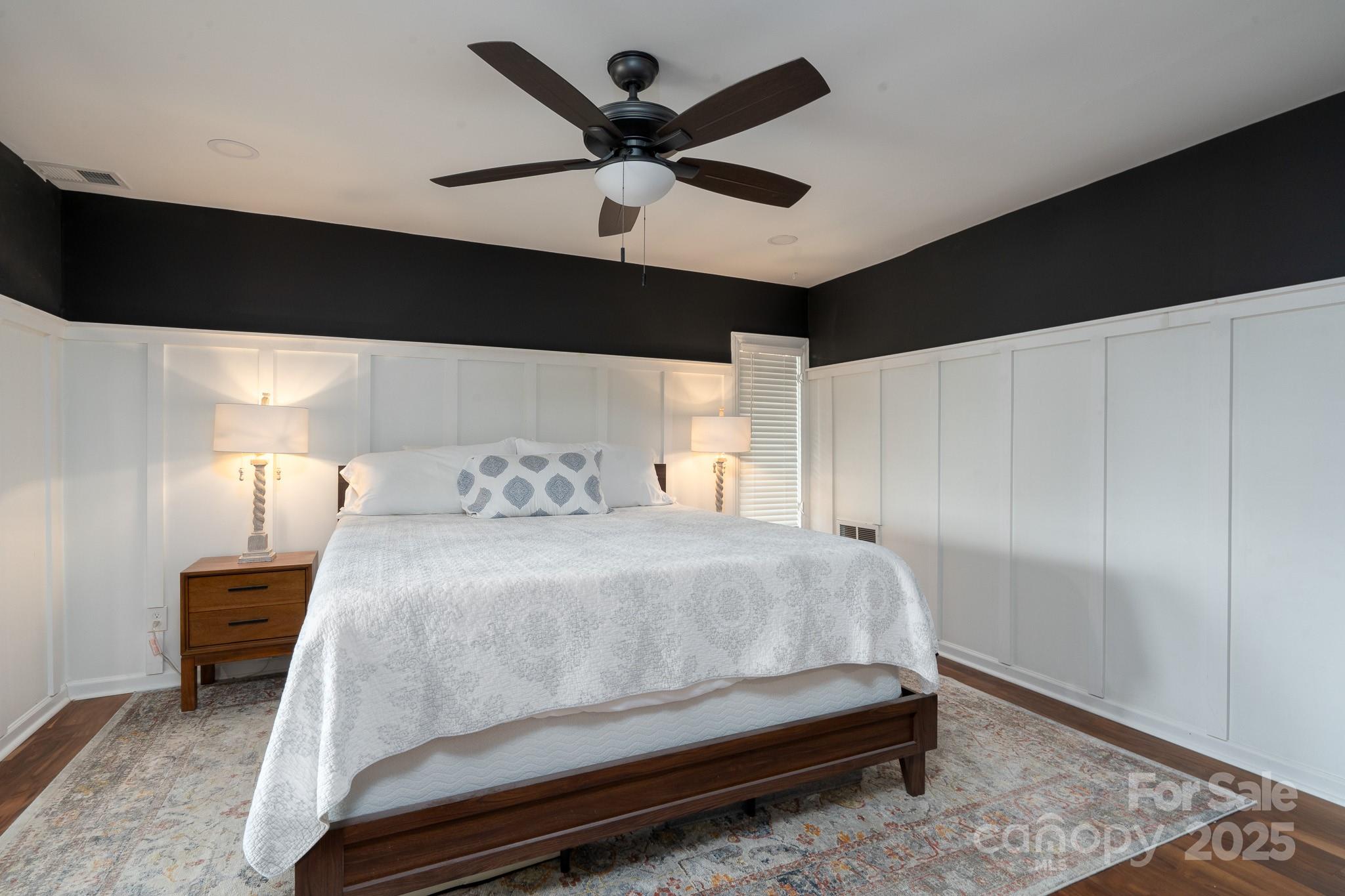 2066 Marquesas Avenue Fort Mill, SC 29708 - Photo 24 of 45 a bedroom with a bed and a ceiling fan