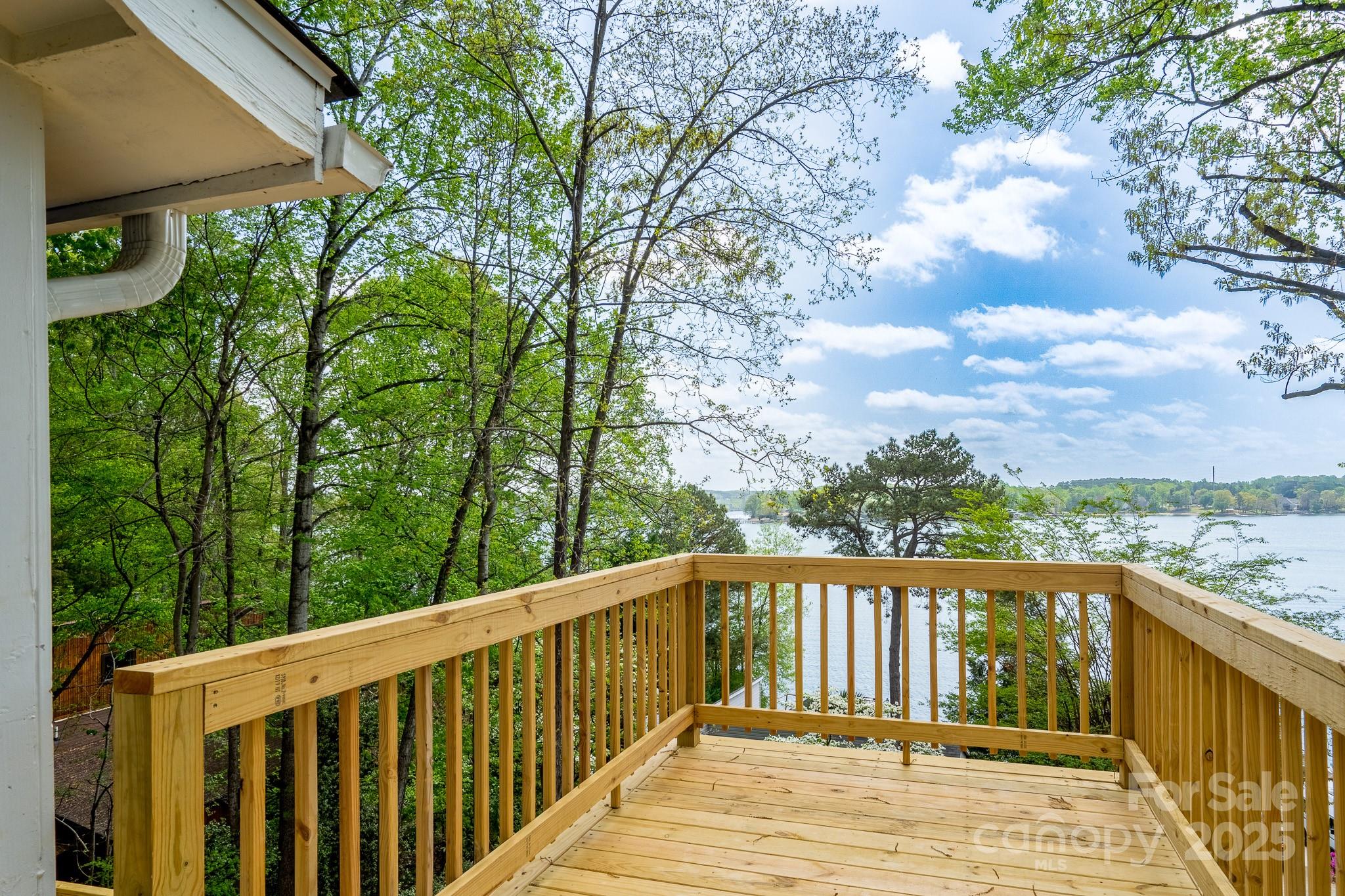 2066 Marquesas Avenue Fort Mill, SC 29708 - Photo 44 of 45 a view of a wooden deck and trees