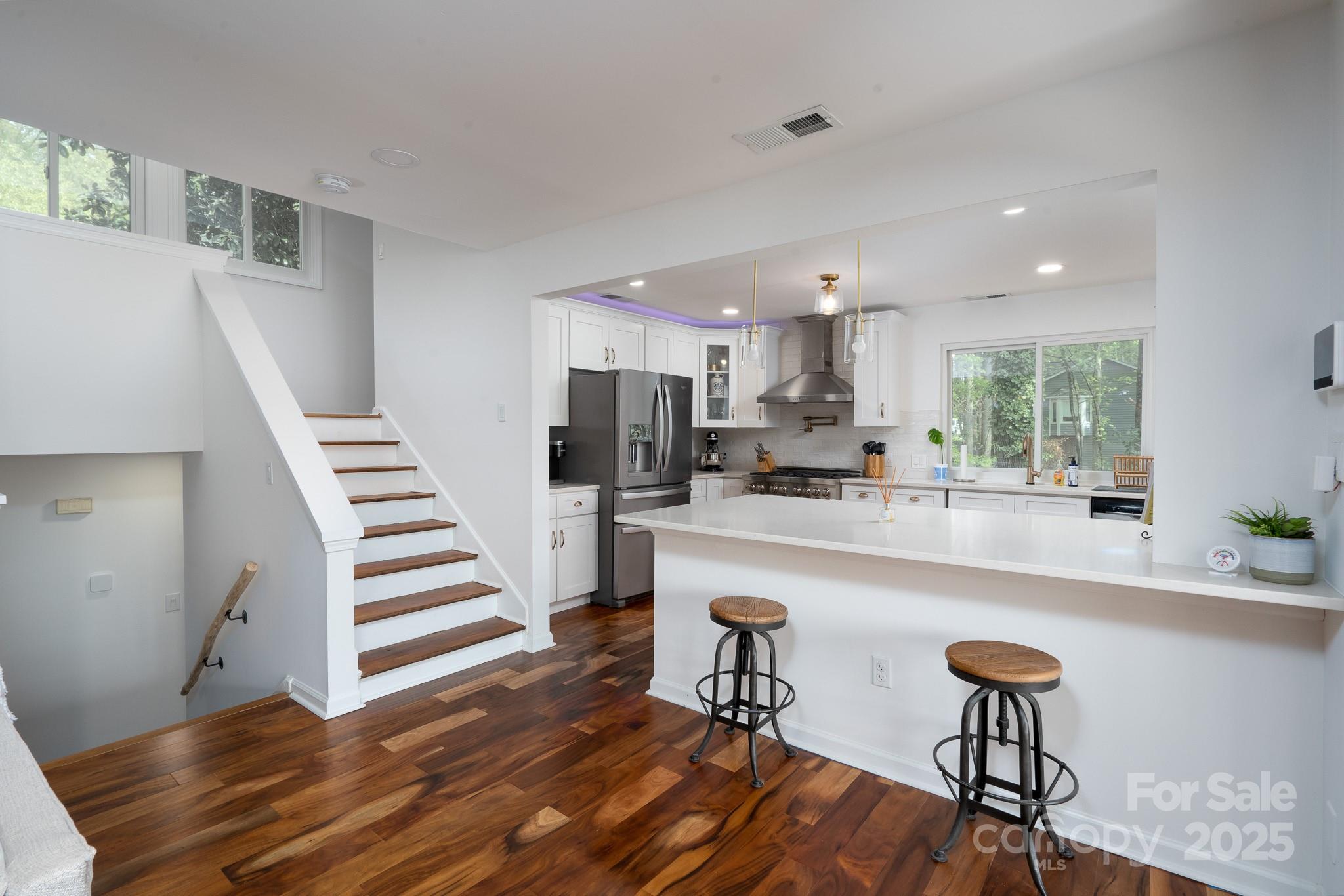 2066 Marquesas Avenue Fort Mill, SC 29708 - Photo 9 of 45 a kitchen with sink and chairs