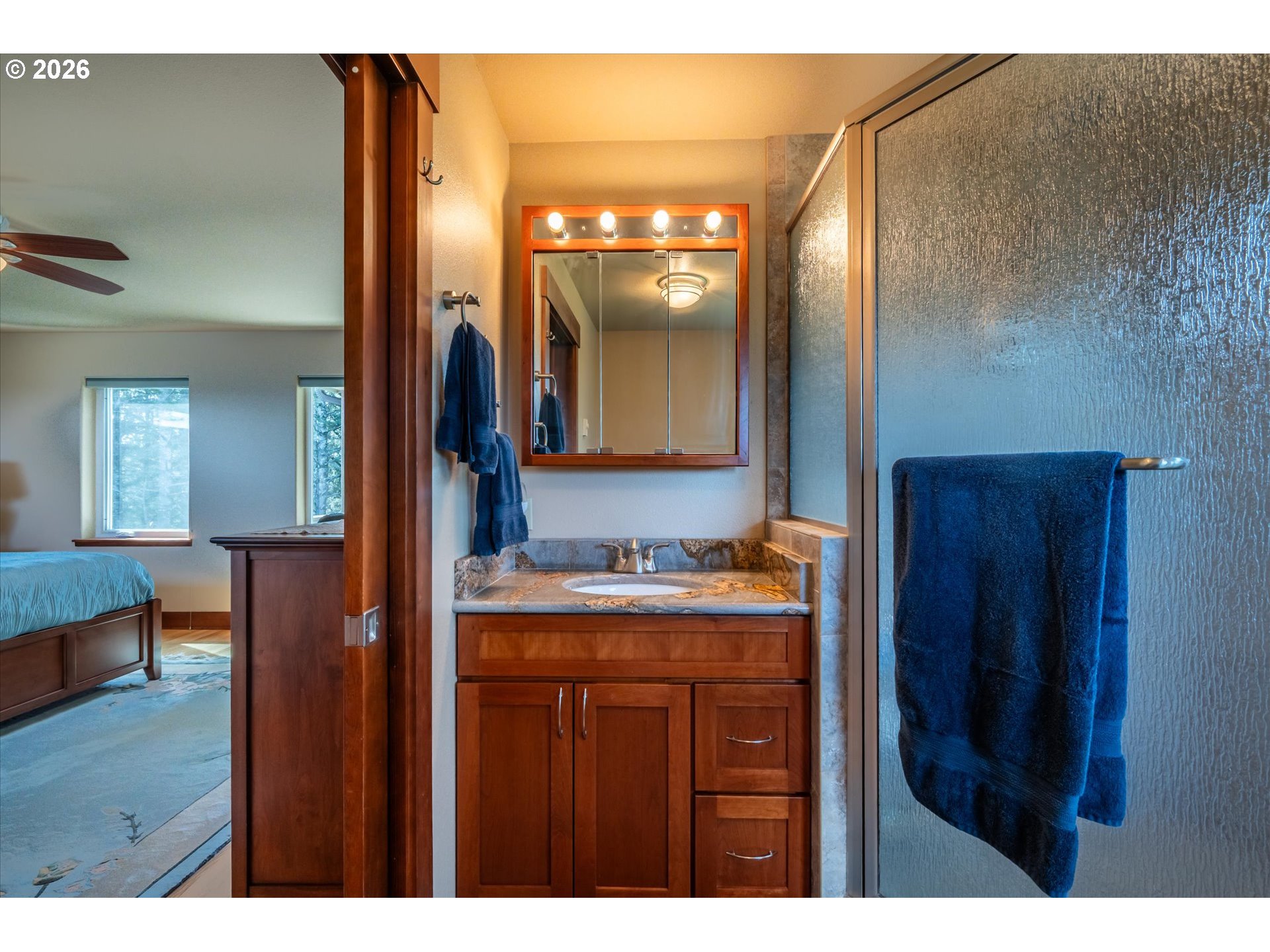 650 Tichenor Cemetery Road Port Orford, OR 97465 - Photo 22 of 48 a bathroom with a sink vanity and a mirror
