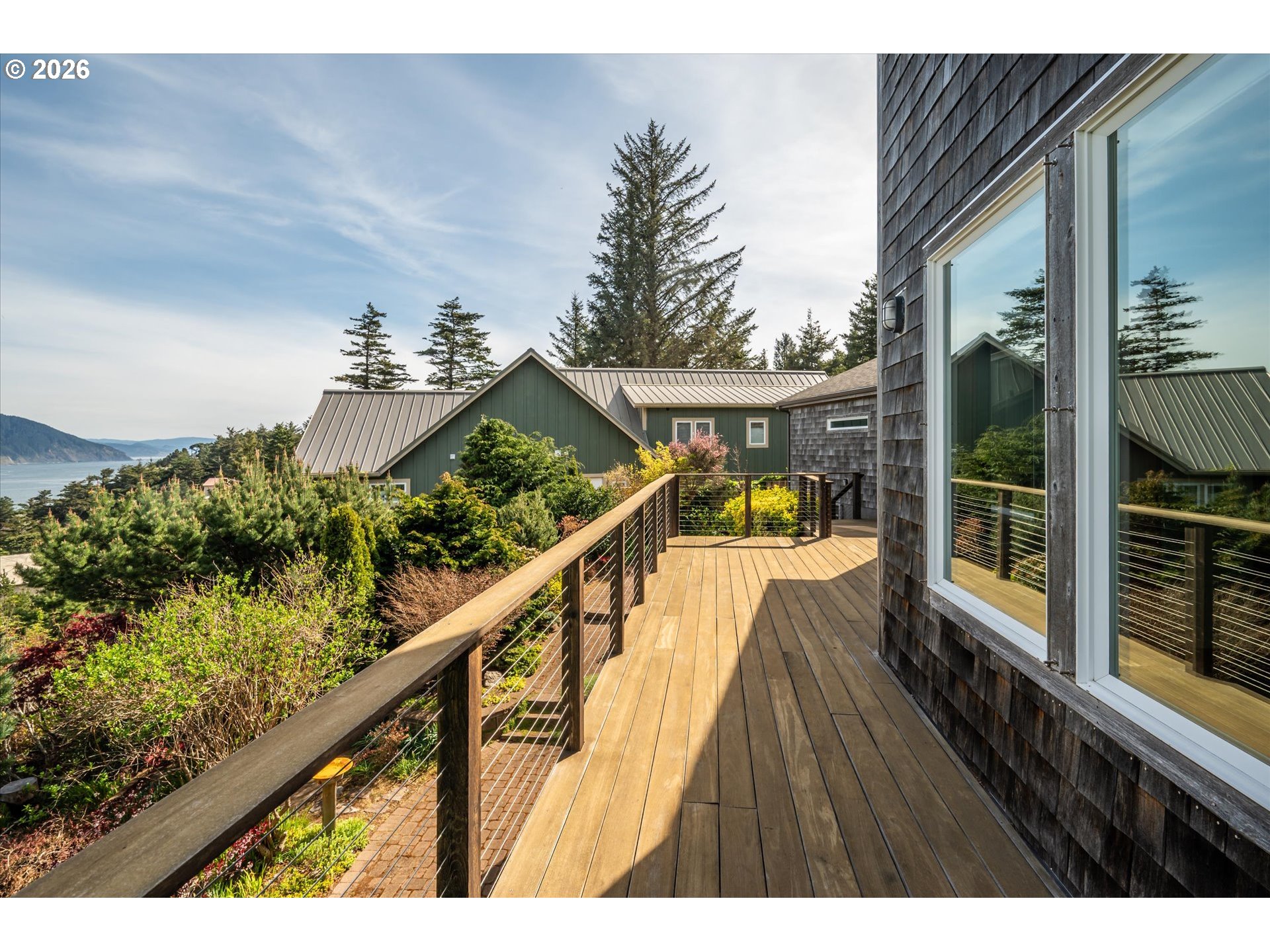650 Tichenor Cemetery Road Port Orford, OR 97465 - Photo 35 of 48 a view of balcony with wooden floor