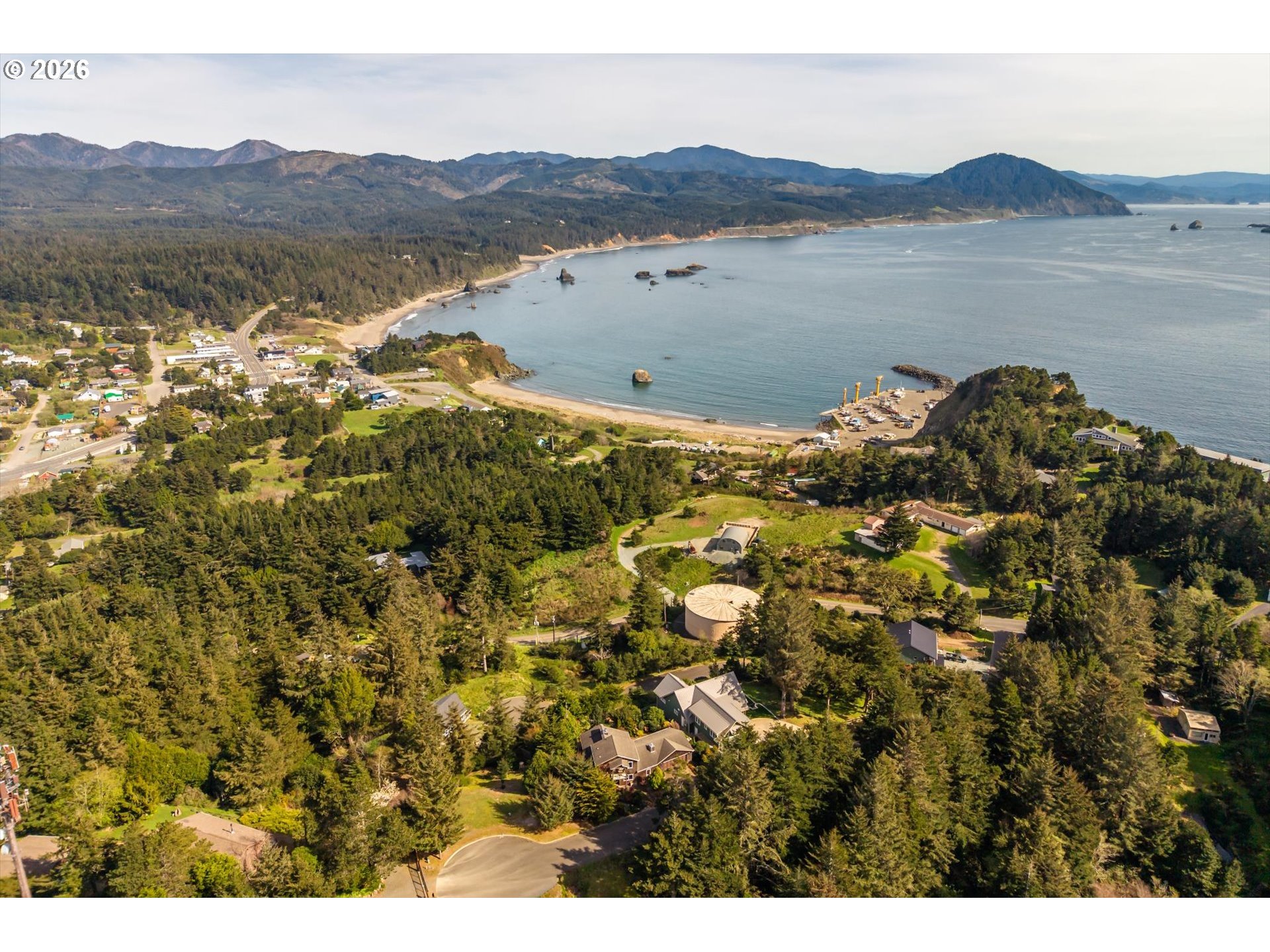650 Tichenor Cemetery Road Port Orford, OR 97465 - Photo 40 of 48 a view of a lake with a mountain