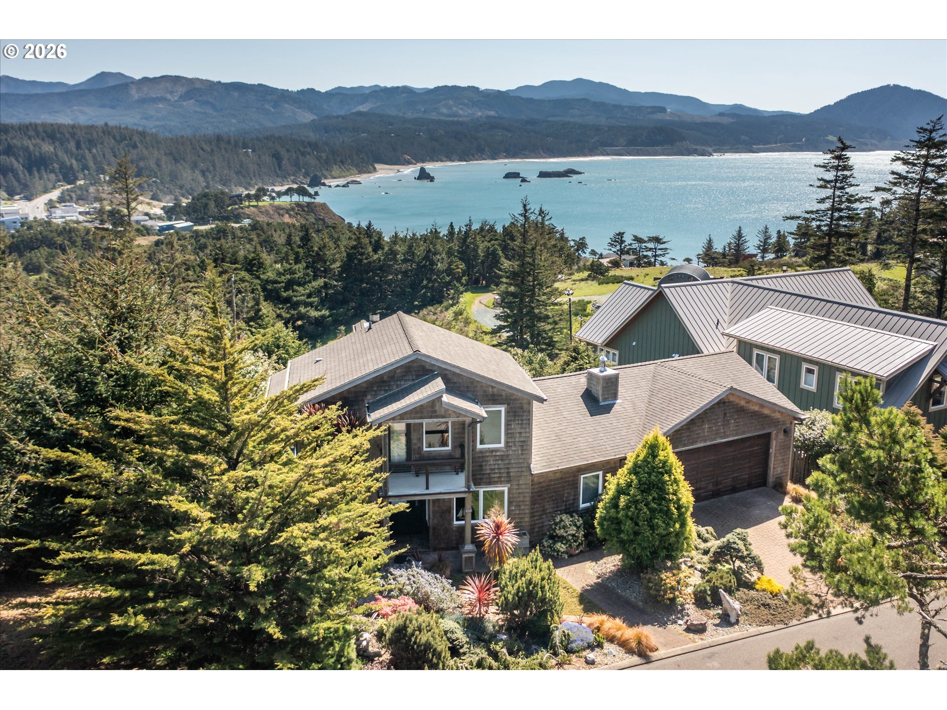 650 Tichenor Cemetery Road Port Orford, OR 97465 - Photo 47 of 48 a view of a house with a lake view