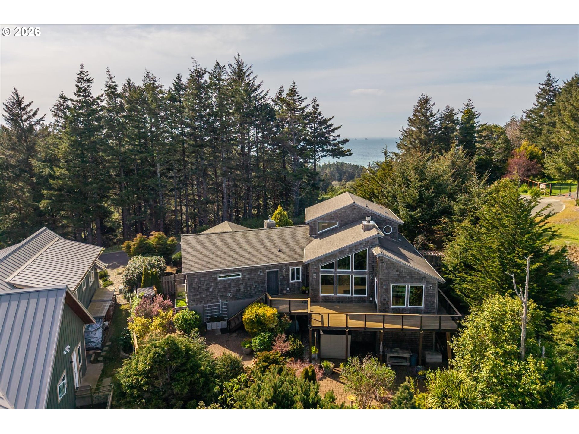 650 Tichenor Cemetery Road Port Orford, OR 97465 - Photo 48 of 48 a front view of a house with a garden