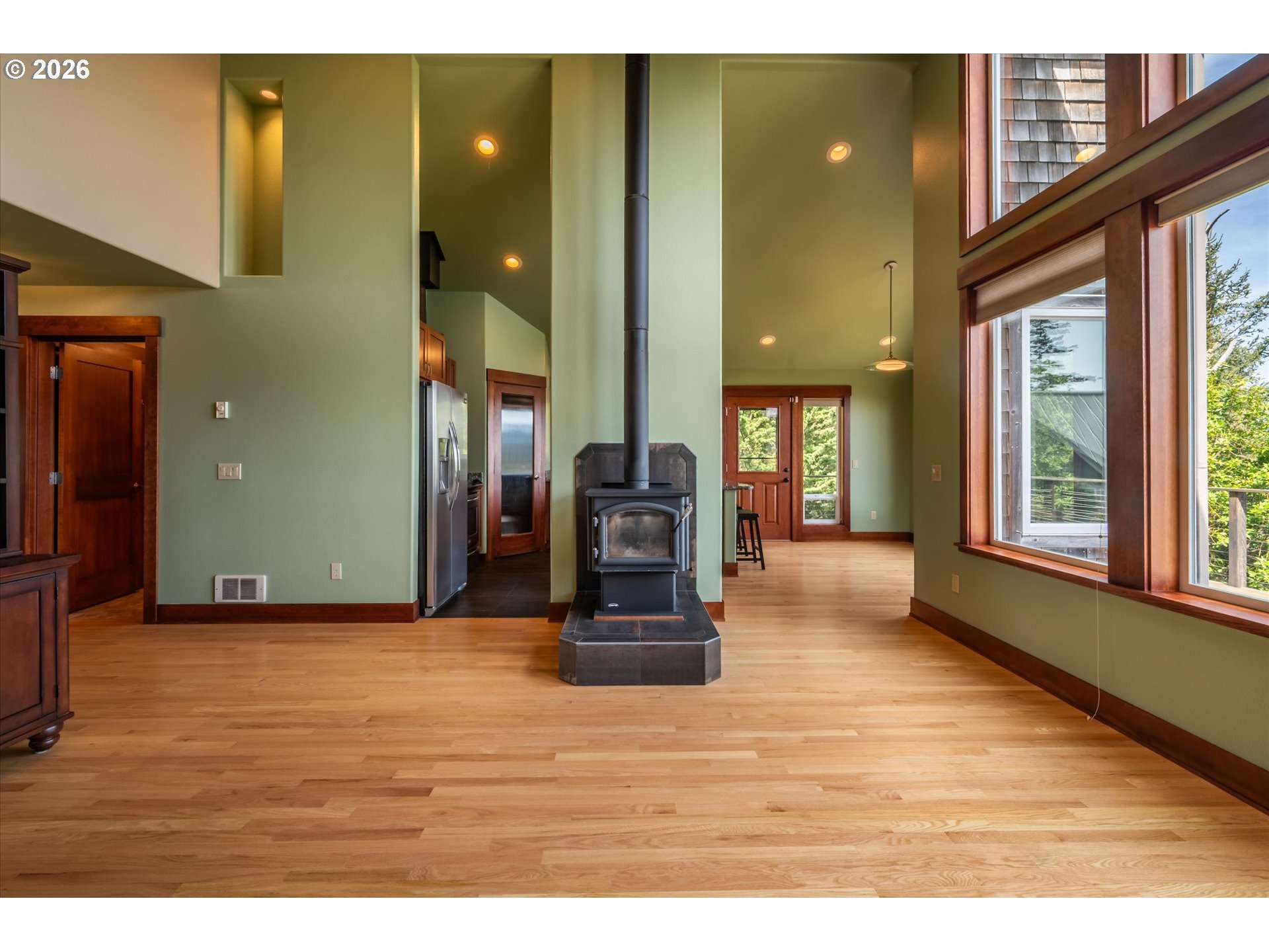650 Tichenor Cemetery Road Port Orford, OR 97465 - Photo 8 of 48 a view of a living room with furniture and floor to ceiling windows