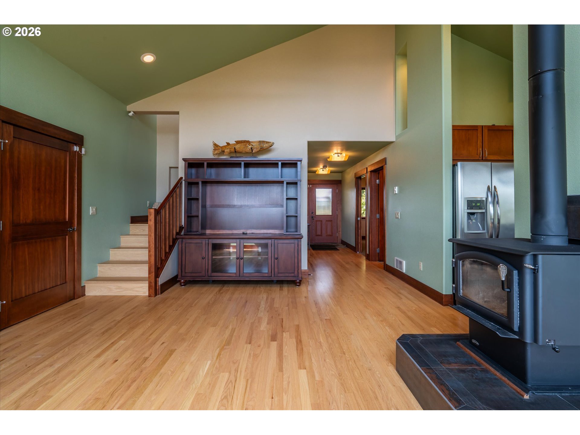 650 Tichenor Cemetery Road Port Orford, OR 97465 - Photo 10 of 48 a living room with furniture and a wooden floor