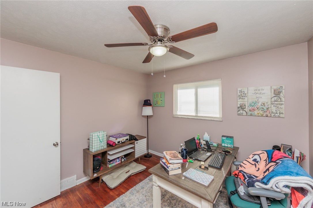 4260 Ridgeview Road Cleveland, OH 44144 - Photo 27 of 34 Home office with ceiling fan and dark wood-type flooring