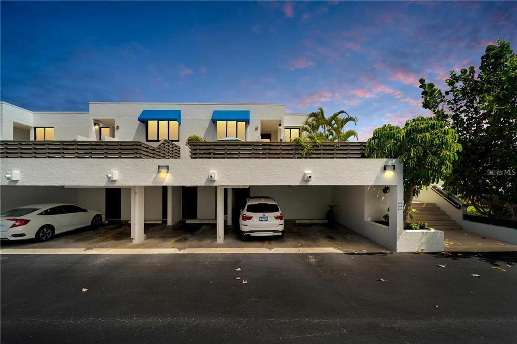 829 Bayport Way, Unit 829 Longboat Key, FL 34228 - Photo 2 of 58 a car parked in front of a building