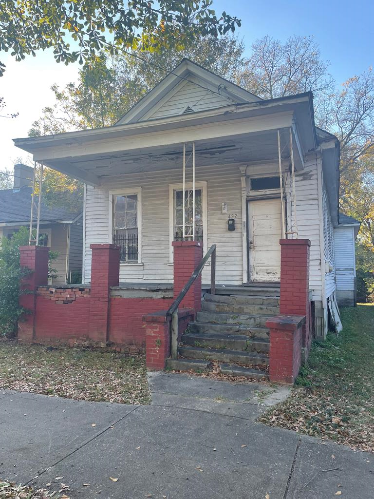 437 2nd Avenue Columbus, GA 31901 - Photo 1 of 1 a front view of a house with garden