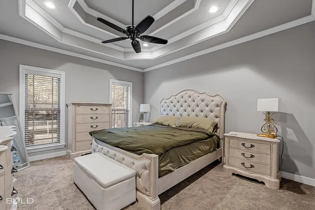 a living room with a bed and furniture