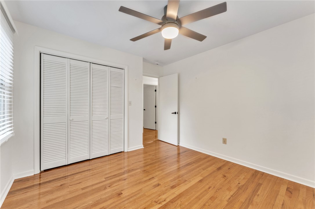 4416 Denver Cove Road Anderson, SC 29625 - Photo 21 of 31 Hardwood floors and a ceiling fan create a comfortable and inviting atmosphere.
