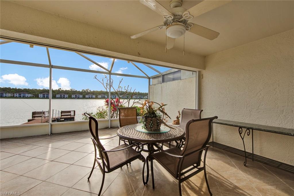 2912 West Crown Pointe Boulevard, Unit 141 Naples, FL 34112 - Photo 26 of 32 a dining room with furniture and window