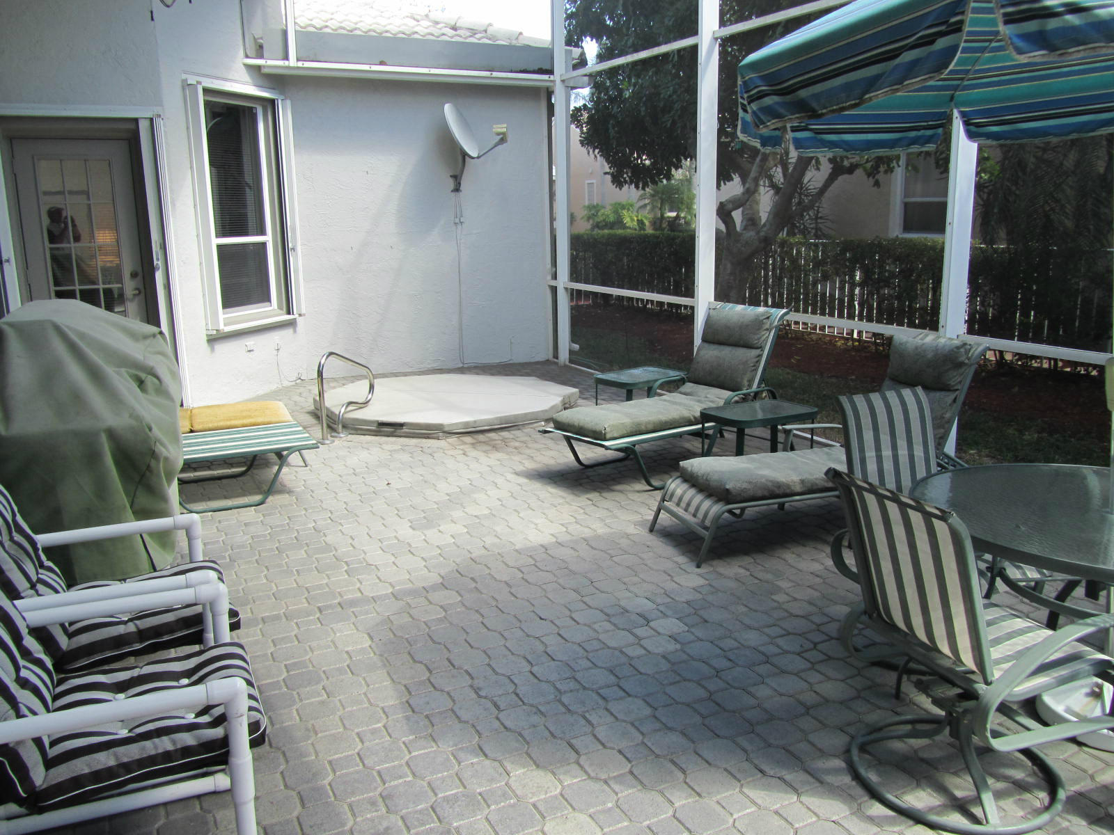 23489 Torre Circle Boca Raton, FL 33433 - Photo 9 of 9 Screened patio & spa