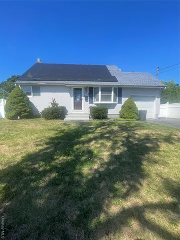 a view of a house with a big yard