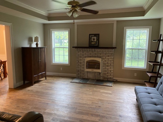 234 Alsup Road Prospect, TN 38477 - Photo 5 of 38 a view of an empty room with a window and wooden floor