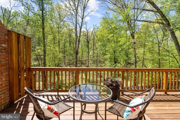 a view of a chairs on the roof deck
