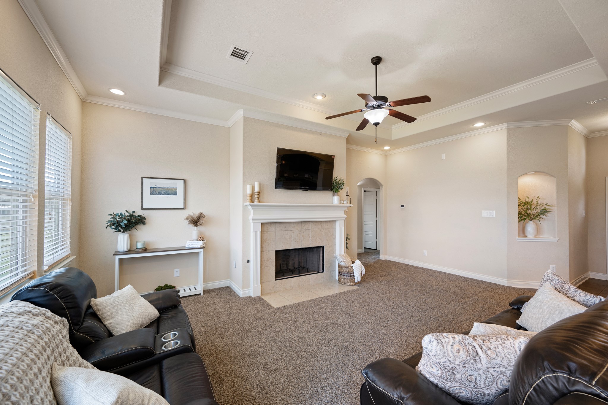 8131 Brinkmeyer Road Needville, TX 77461 - Photo 10 of 34 A cozy fireplace adds character and warmth to the space.