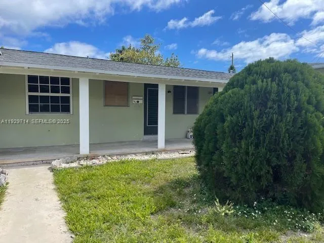 front view of house with a yard