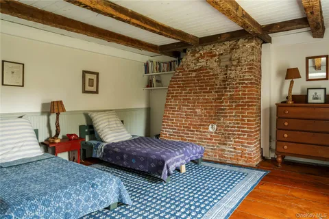 a hallway with a view of living room