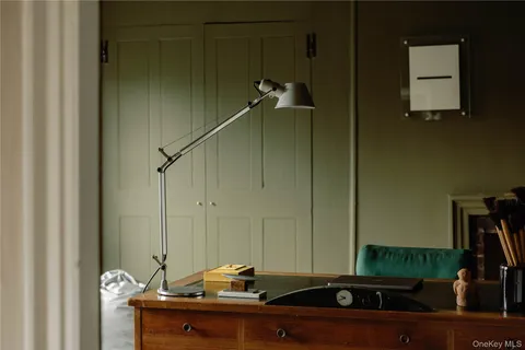a bathroom with a sink and mirror
