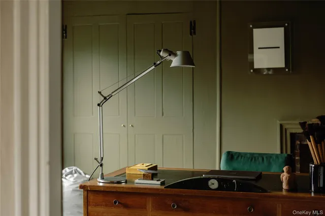 a bathroom with a sink and mirror