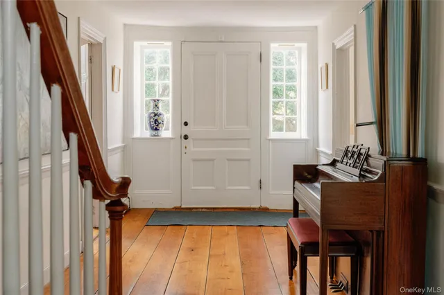 a kitchen with a sink a stove and cabinets