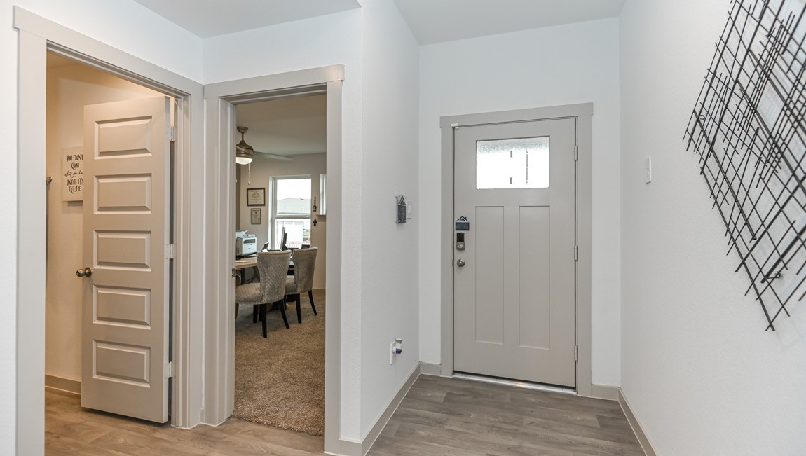 7918 Murciana Drive Rosharon, TX 77583 - Photo 10 of 21 a view of a livingroom from a hallway